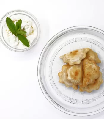 Traditional fried pie with lemon zest and mint Cretan Cuisine
