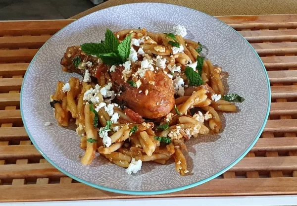 Rooster in tomato sauce with homemade pasta by Chef Nikos Stratigis