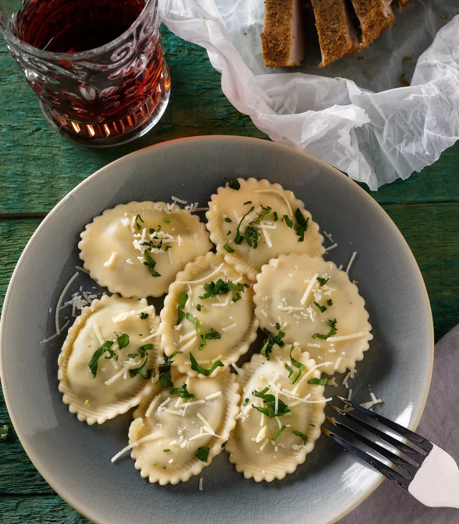 Cooked greens and “Apaki” cured meat-stuffed Ravioli Freshly frozen pasta